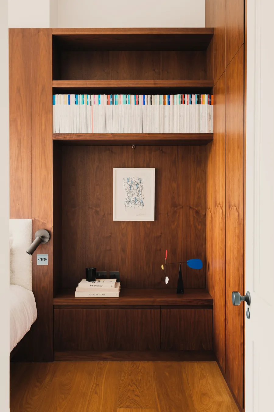 Walnut panelling and shelving.