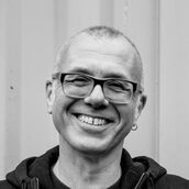 Black and white portrait of Sam Scott.