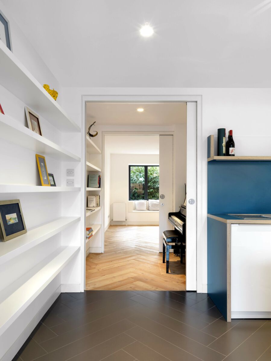 ​Floating shelving and laminated plywood kitchen.