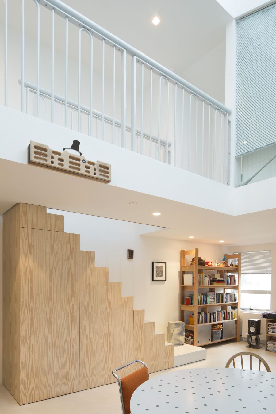 Douglas Fir veneered stair cladding and mezzanine walkway.