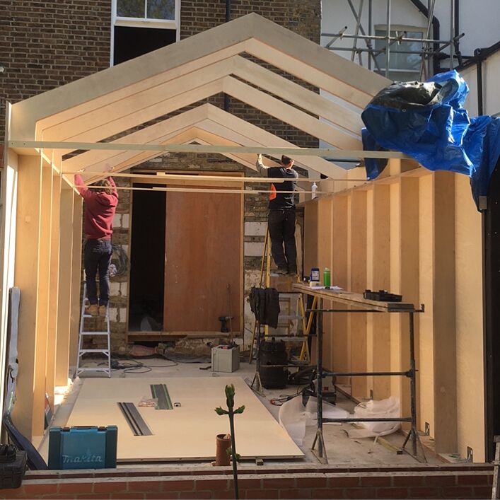 ​Constructing the birch plywood structure onsite.