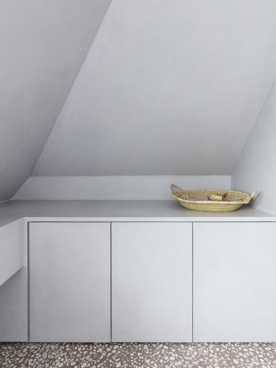 Bathroom cabinets with micro cement finish.