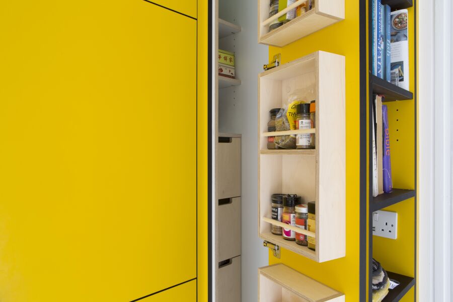 Bespoke birch plywood spice racks and larder drawers.