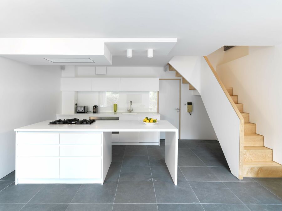 ​Modern kitchen, solid maple winding stair case..