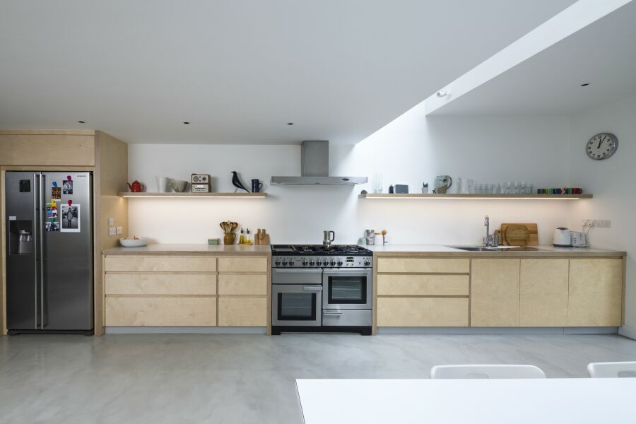 Plywood kitchen with no overhead cabinets.